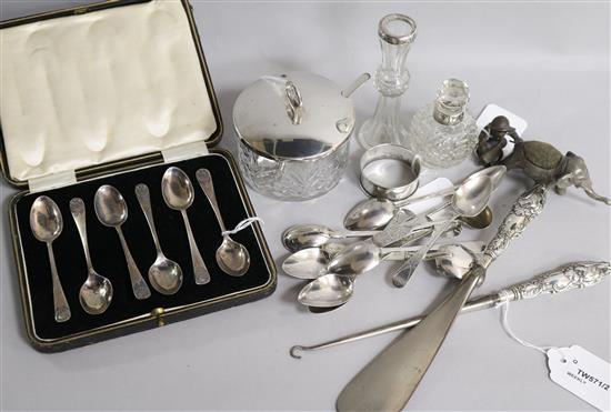 A set of six silver shell pattern teaspoons, cased, six Georgian bright-cut teaspoons and sundries,